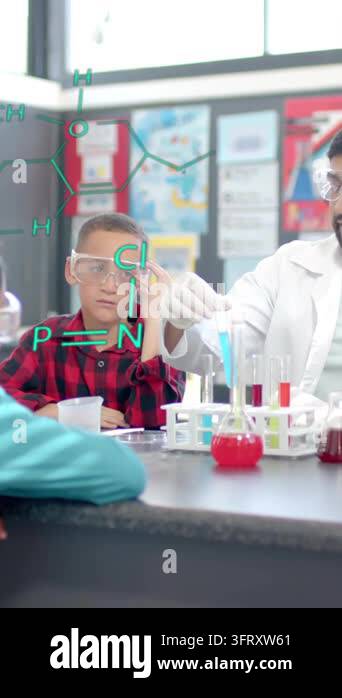 Chemistry formulas over teacher explaining experiment to children in ...