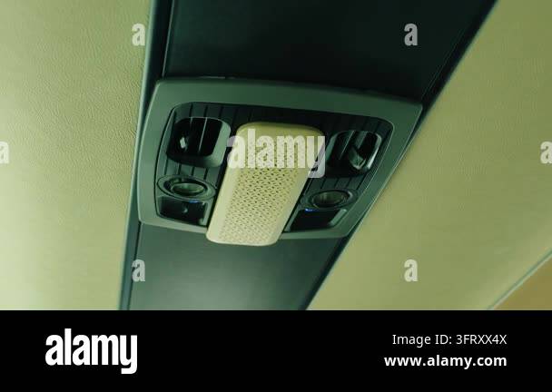 Overhead bus air vents and passenger reading lights in close view ...