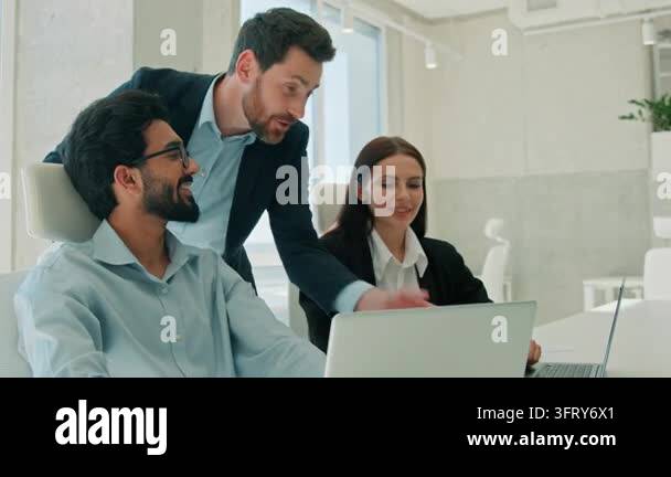 Happy multiethnic business team working laptops indoor office leader ...