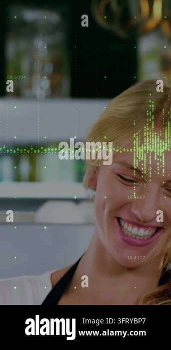 Home cook smiling and laughing in cooking kitchen, green wave reacting ...