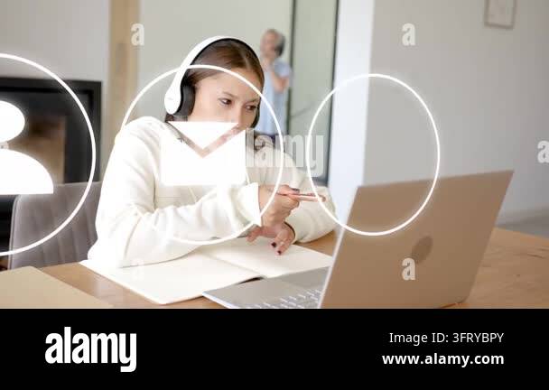 Teenager presenting to laptop, pointing and tapping as animated UI ...