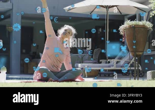Senior raising arm, starting side stretch, opening arms wide, blue ...