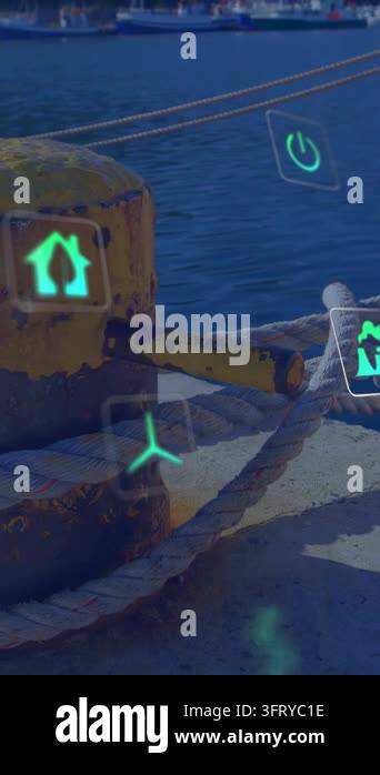Vertical video: Fading green icons drifting past yellow bollard, rope ...