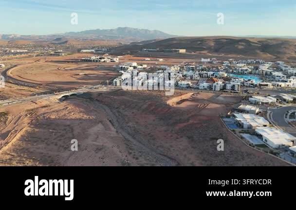 Aerial view of a desert housing development near mountains Stock Video ...