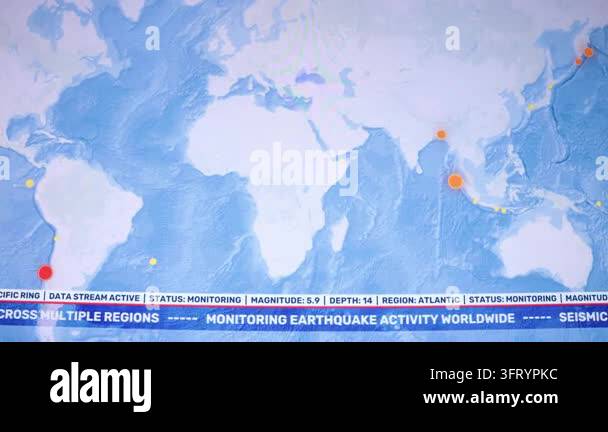 Camera shot computer screen monitor showing global earthquake activity ...