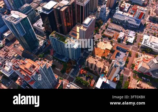 Footage over the rooftops of high-rise modern buildings in downtown San ...