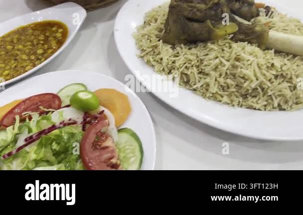 Pakistani food spread with rice and meat Stock Video Footage - Alamy