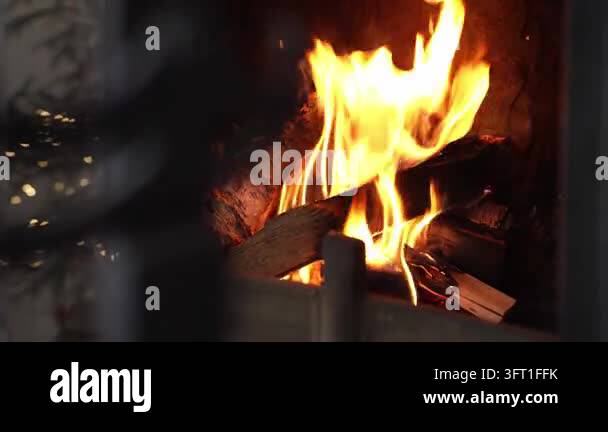 Closeup Of Burning Fireplace With Christmas Tree And Blinking Lights ...