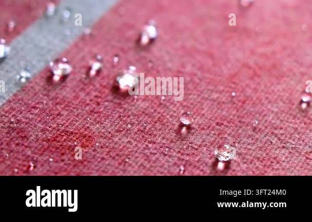 Surface Texture Graphics Small rounded water droplets gathered across a textured carpet surface ...