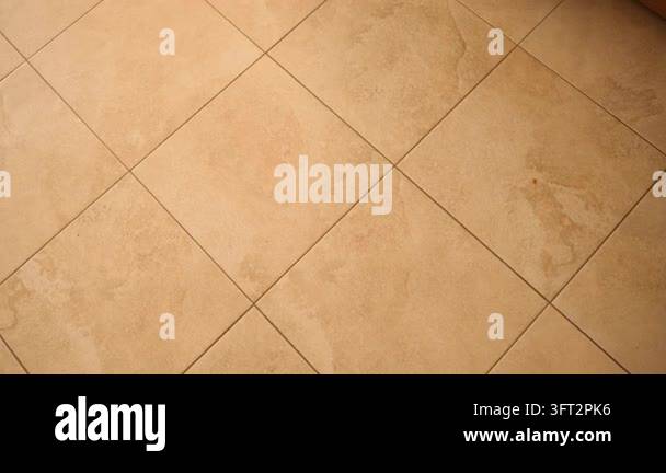 Texture For Background Diagonal view of large beige floor tiles with mottled sandstone texture ...