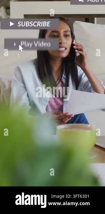 Customer Handling Documents Vertical video: Woman sitting on couch with phone, handling papers as ...