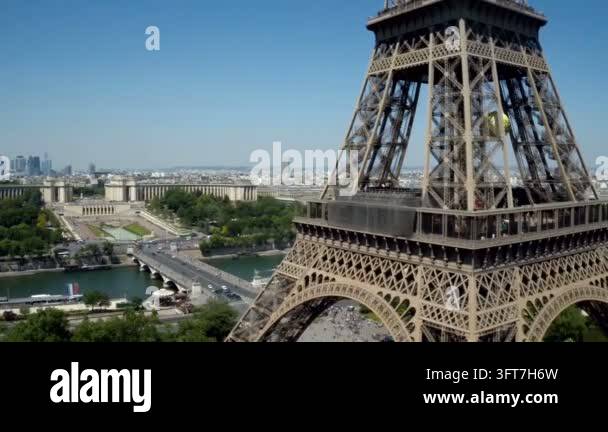 Aerial close view of Eiffel Tower with Paris cityscape in the ...