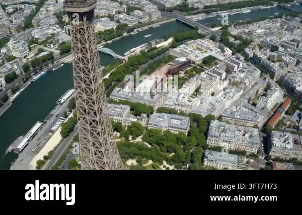 Aerial close view of Eiffel Tower with the Seine River and Paris ...