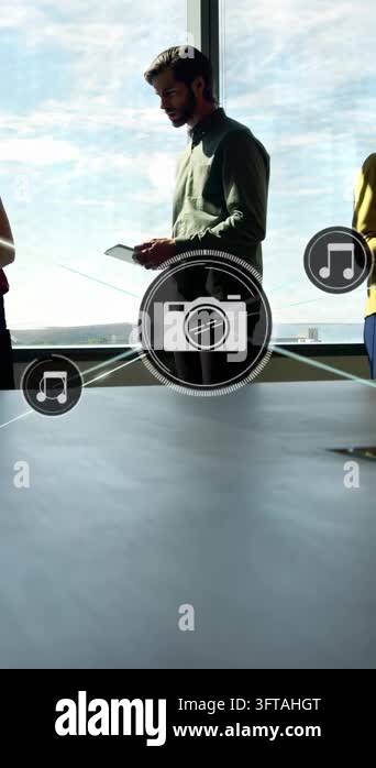 Vertical video: Man holding tablet starting icons for business ...