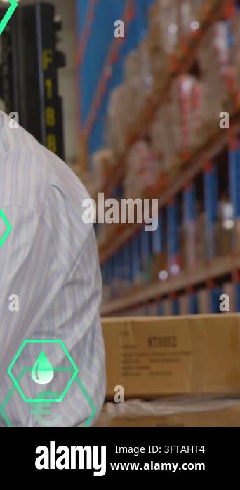 Warehouse lead checking boxes as colleague hand touching box, AR icons ...