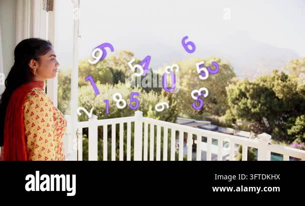 Woman standing in doorway watching numerals appearing then rising above ...