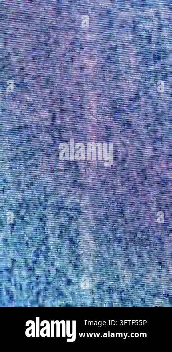 Blue and pink static shimmers across a vertical pixel screen Stock ...