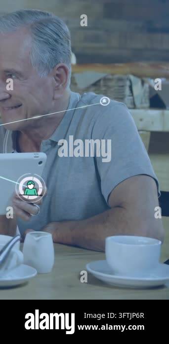 Vertical video: Senior man holding tablet looking, making user icons ...