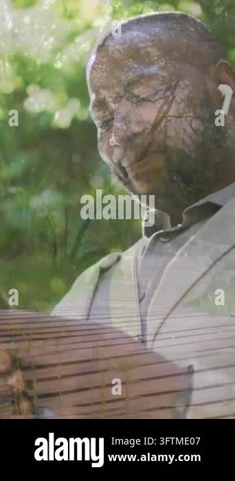 Animation of social media icons with numbers over african american man ...
