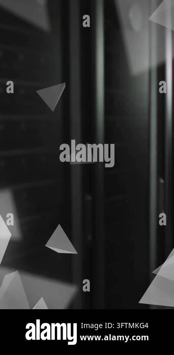 Animation of floating 3d grey pyramids over computer server room. Data ...