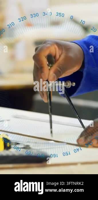 Placing metal compass, man in royal blue shirt adjusting hinge and ...