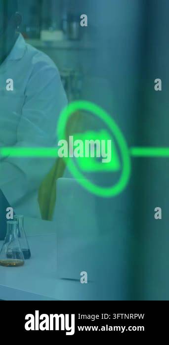 Vertical video: Man lab tech inspecting vials for testing as green ...