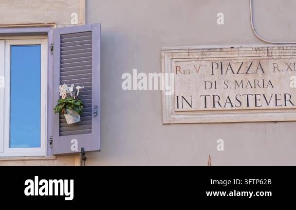 Close up view of the ancient marble street sign of Piazza di Santa ...