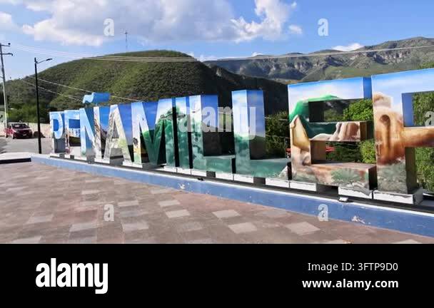 Large colorful Penamiller letter sculpture with local landscape murals ...
