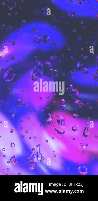 water drops in the glass on colorful surface Stock Video Footage - Alamy