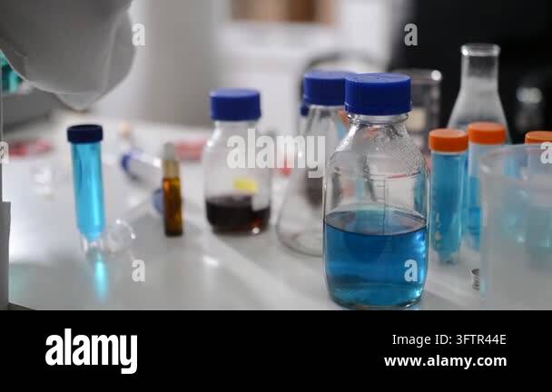 chemical experiment with a laboratory glassware Stock Video Footage - Alamy