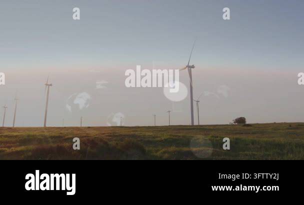 Wind turbines rotating while data feed activating HUD overlays showing ...