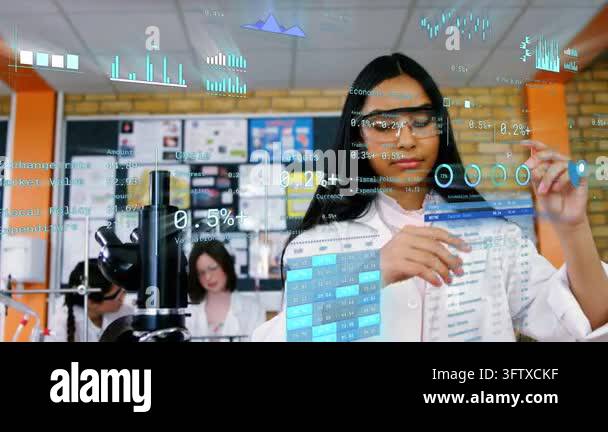 Teen female tapping holo UI with stylus in science lab, adjusting ...