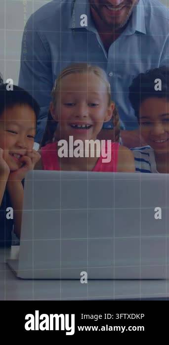 Vertical video: Kids using laptop in class smiling while teacher ...