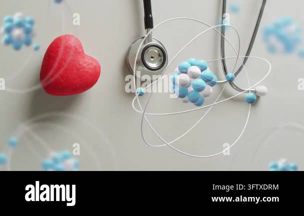 Molecular clusters appearing above stethoscope, orbiting and rotating ...