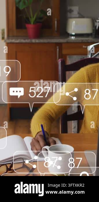 Animation of media icons floating over couple using computer. Global ...