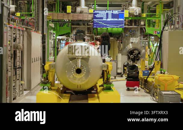 Slow motion: Scientist working at a superconducting magnet testing ...