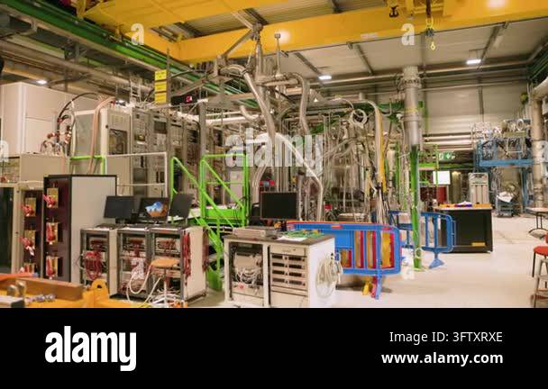 Complex piping and electronic control systems inside a CERN HILUMI ...