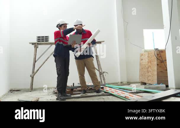 Construction inspectors and engineer discussing project details at an ...