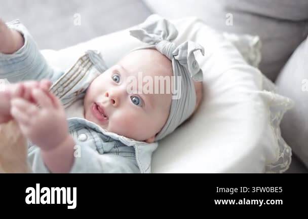 This heartwarming video showcases a mother interacting playfully with ...
