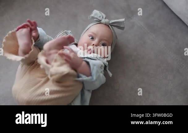 This heartwarming video showcases a mother interacting playfully with ...