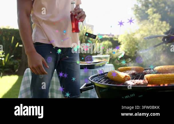 Animated AR overlays appearing, two men clinking bottles and flipping ...