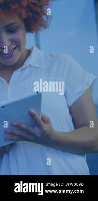 Vertical video: Woman tapping tablet, starting lock icons, gauges ...