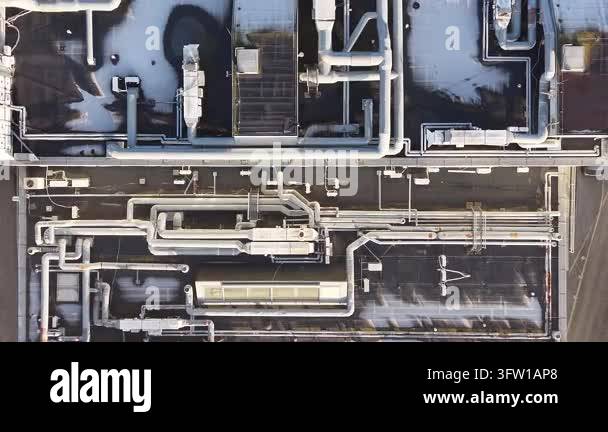 Industrial ventilation pipes and units on city rooftop Stock Video ...