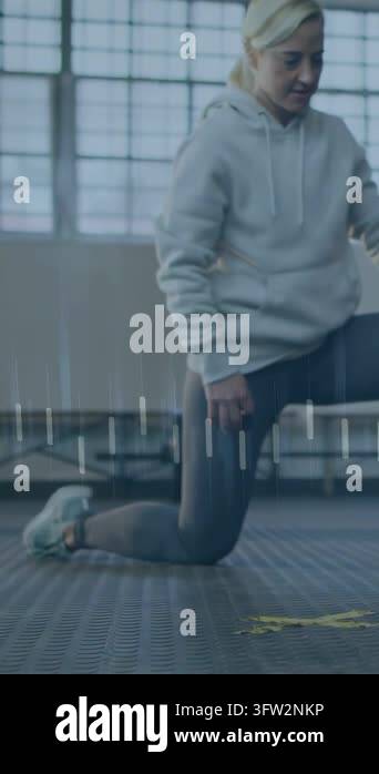 Female exerciser kneeling in gym shifting weight and causing HUD line ...
