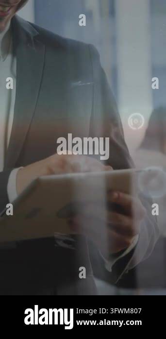Man tapping tablet, initiating HUD, expanding circular icons and data ...