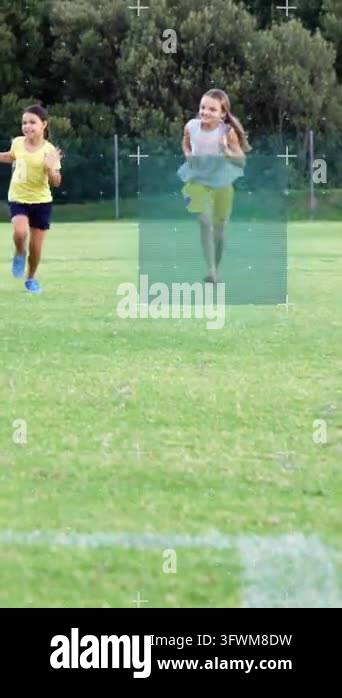 Vertical video: Girls sprinting on signal across schoolyard for sport ...