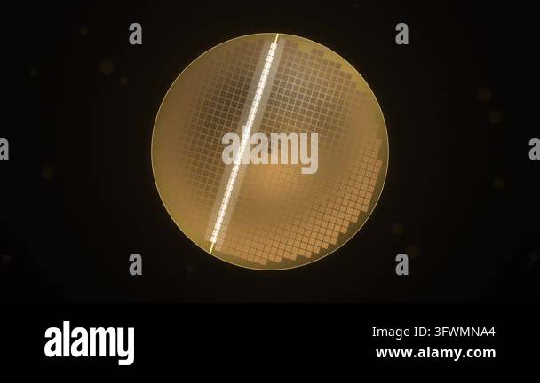 Golden silicon wafer seen from above as a lithography beam lights its ...