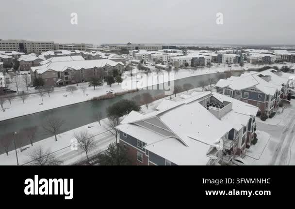 Snow covering buildings and river landscape view Stock Video Footage ...