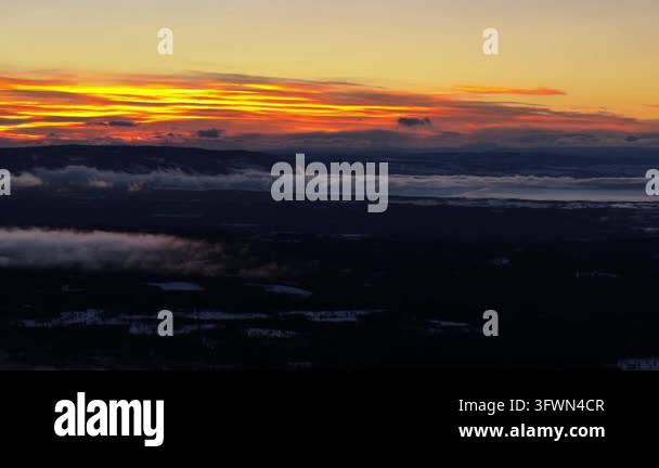 Beautiful sunset over mountains and clouds in sky Stock Video Footage ...
