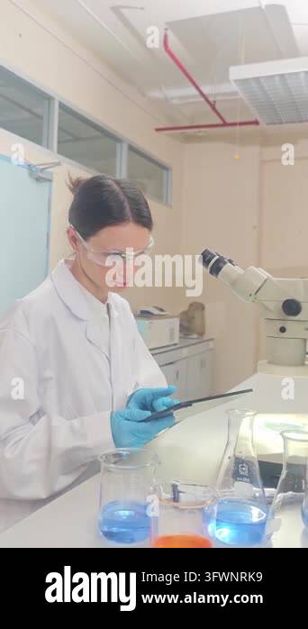 Laboratory room. Female scientists conducting laboratory research with ...